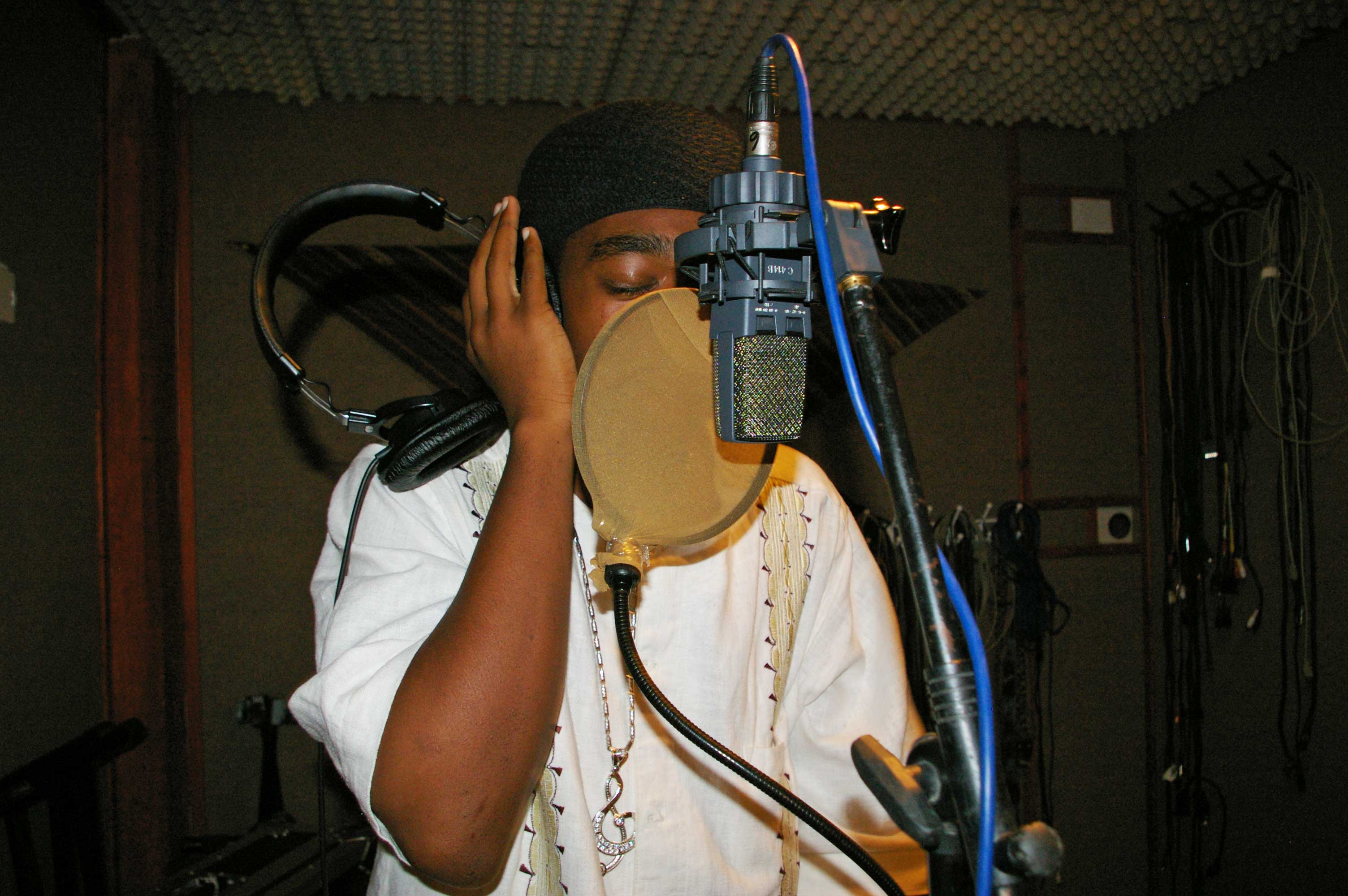 Rapper standing at a microphone