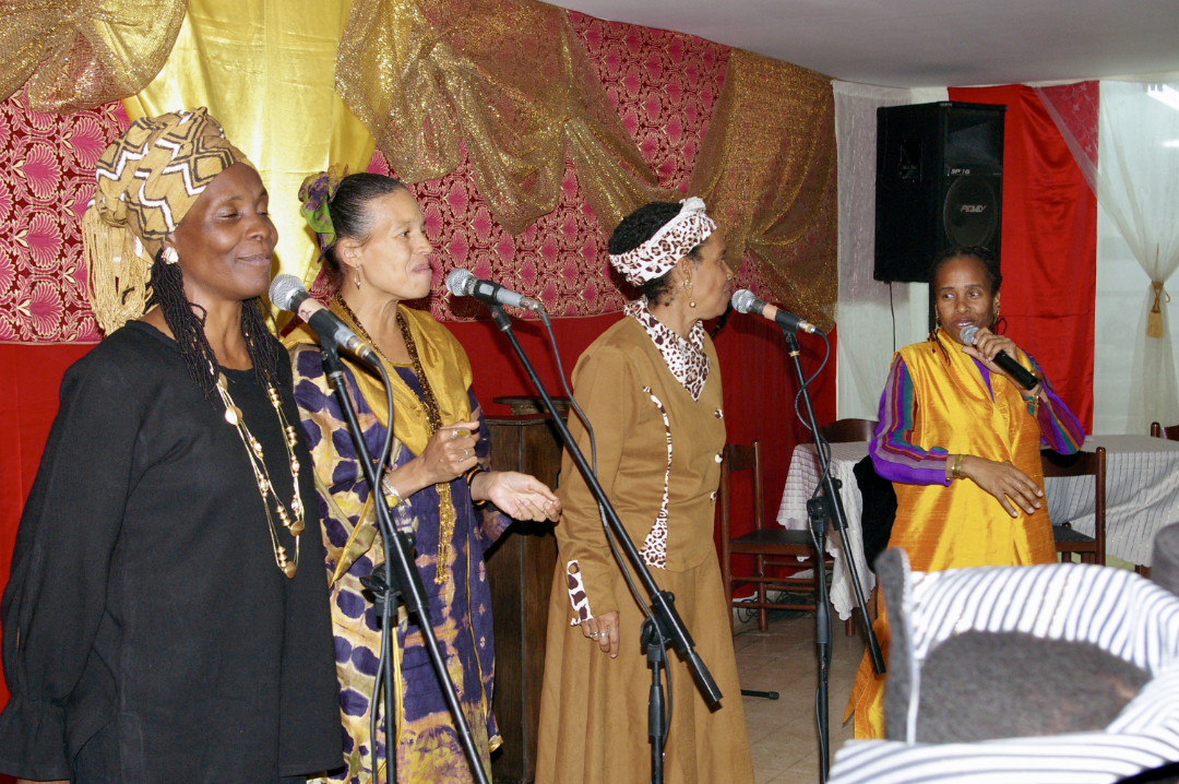 Four African Hebrew Israelite women singing