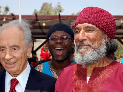 Shemariyah Ellis, center, helped welcome Israeli President Shimon Peres to the African Hebrew Israelites' Village of Peace in August 2008. (Courtesy of Aturah Cathrielah)