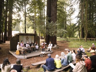 Makom Shalom members and guests participate in a Kabbalat Shabbat service in a redwood grove, March 27, 2026, in Occidental, Calif. (Photo by Gaia Esensten)