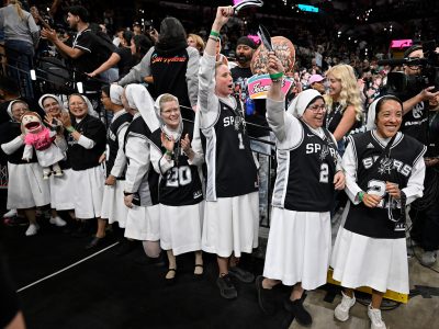 Nuns cheer before the first half of Game 6 in the Western Conference finals NBA basketball playoffs series between the San Antonio Spurs and the Oklahoma City Thunder, Thursday, May 28, 2026, in San Antonio. (AP Photo/Darren Abate)